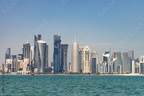 View of city center with skyscrapers from the other side of sea in Doha, Qatar  © Hladchenko Viktor