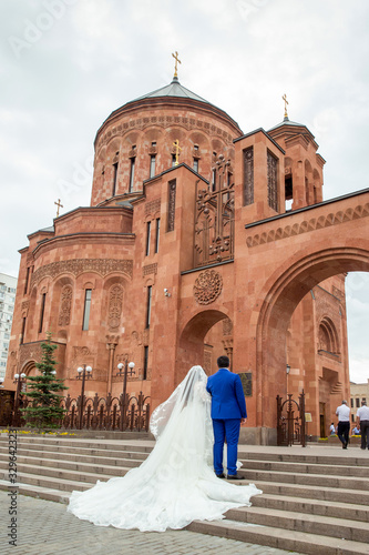 Bride and groom go to church. Wedding day