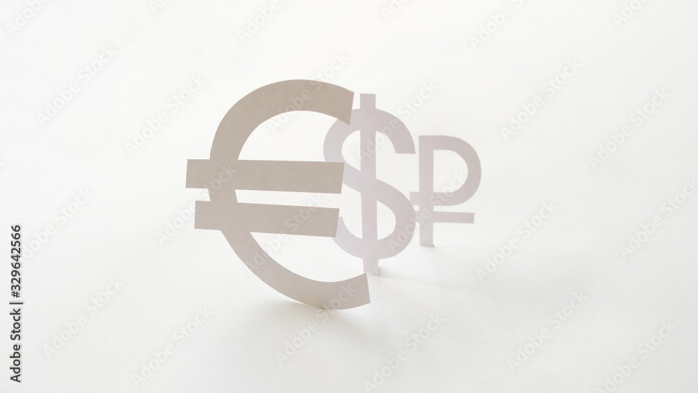 Obraz premium Badges of the currency, cut out of paper. The concept of devaluation of the ruble.