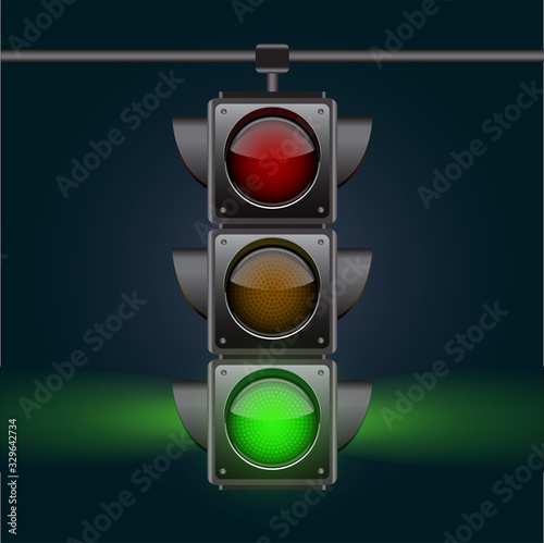 Realistic traffic lights with green lamp on, hanging in night sky.