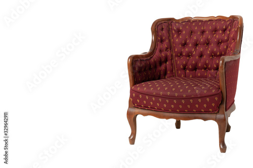 Royal red textile armchair in a classic style. Retro. Antiques. Isolate