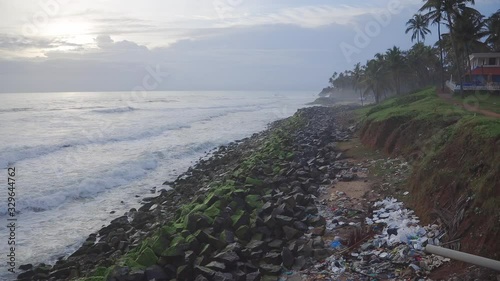 polluted beach varkala india