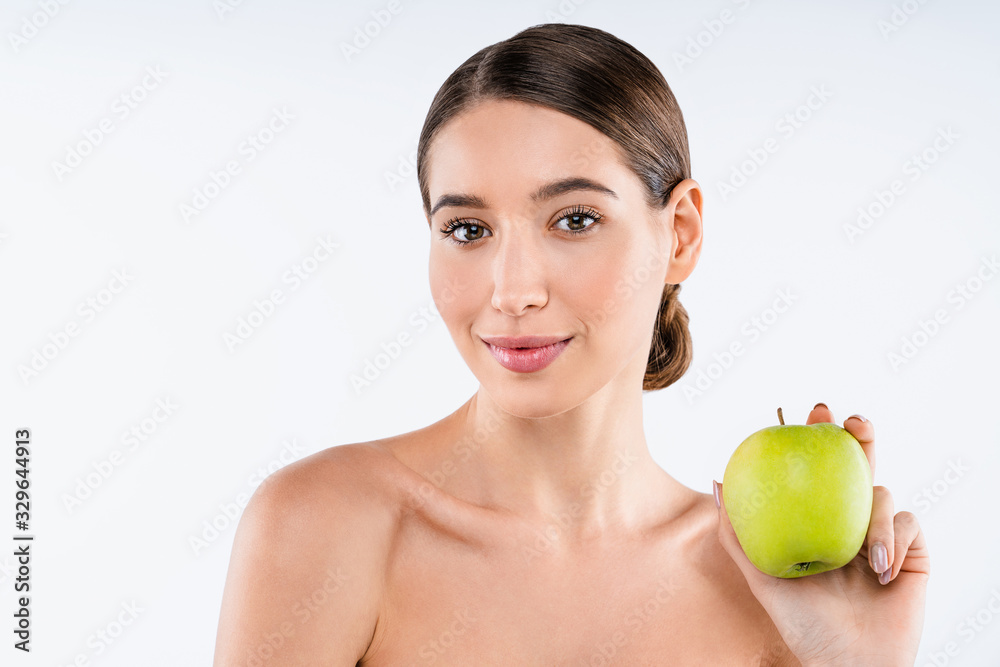 Young smiling woman with apple isolated on white background. Healthy lifestyle concept Young smiling woman with apple isolated on white background. Healthy lifestyle concept