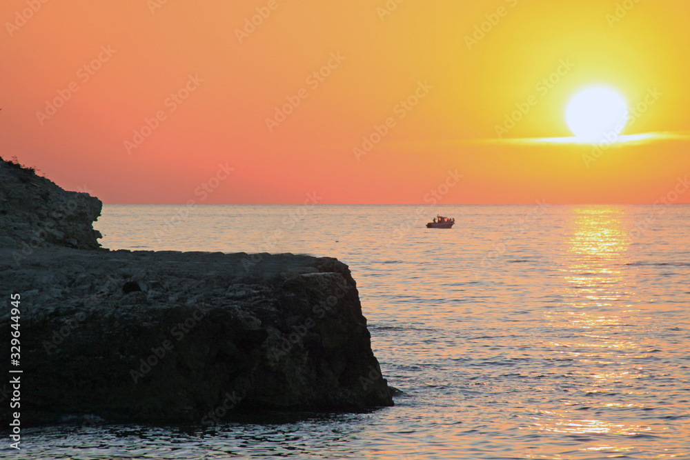 Amazing beautiful sunset on the sea coast