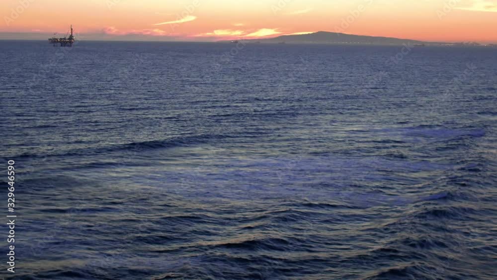 Huntington Beach Pier sunset Southern California landmark on the Pacific Ocean Huntington Beach Pier sunset Southern California landmark on the Pacific Ocean
