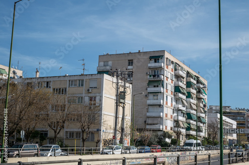 on the streets of Athens with blocks of flats and shops, Greece
