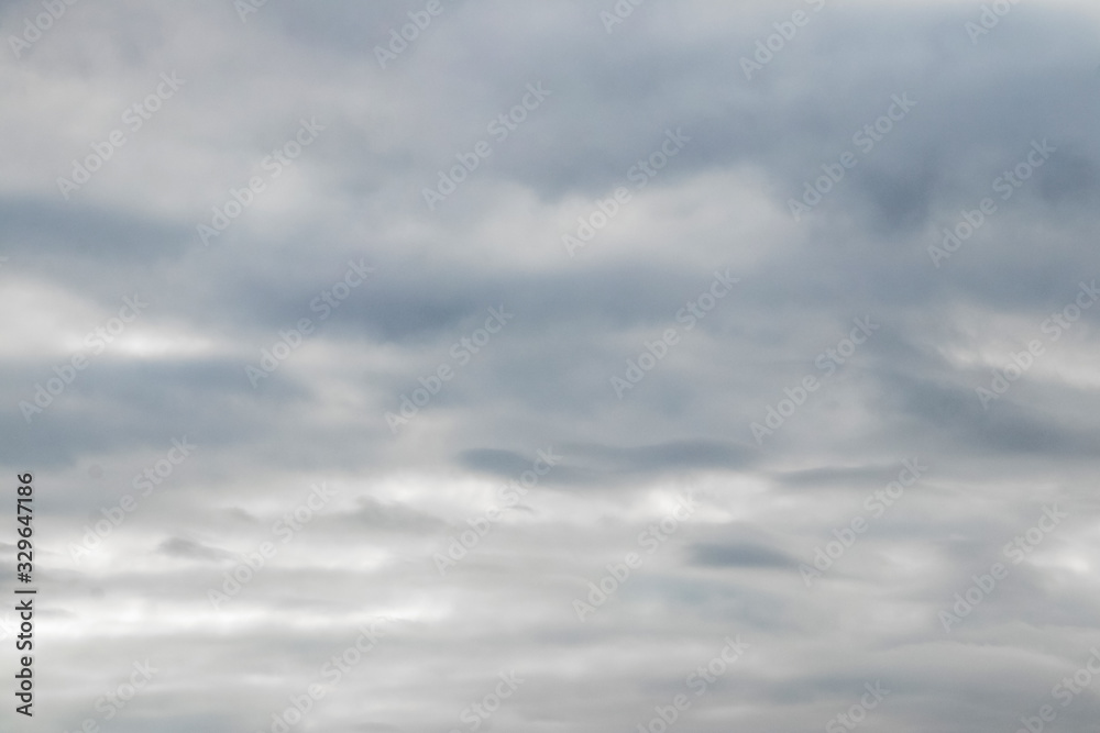 Fototapeta premium Dramatic sky with gray thick storm clouds_