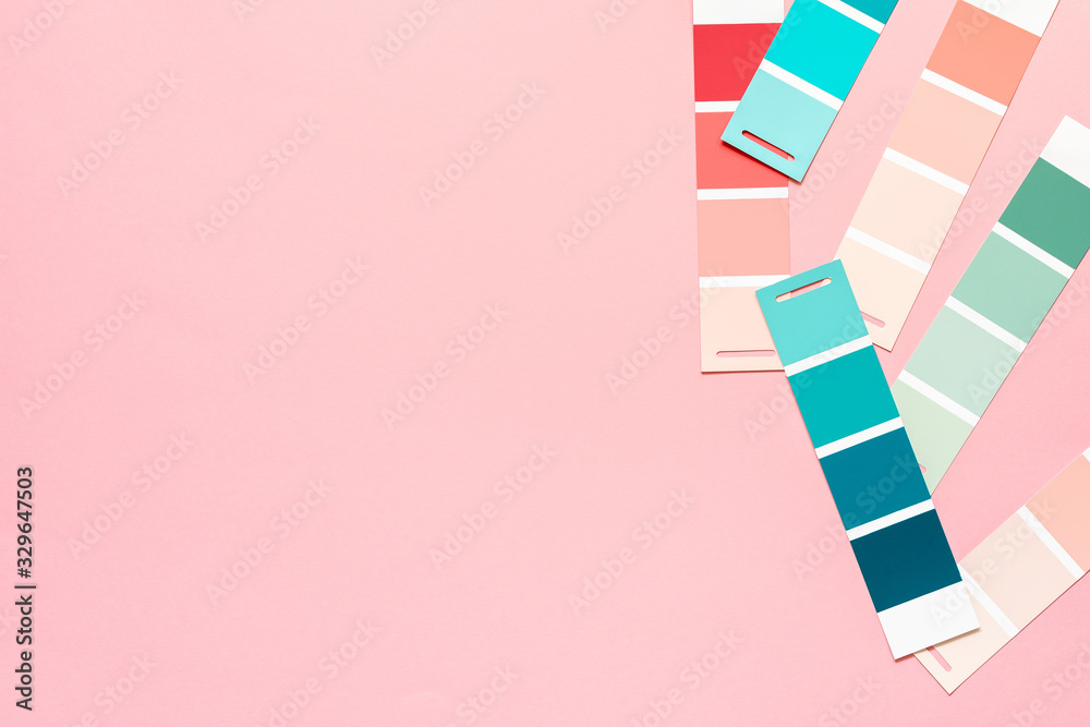 Obraz premium Selection of palette for painting, sample color catalog on a pink background, different shades of pink and green colors