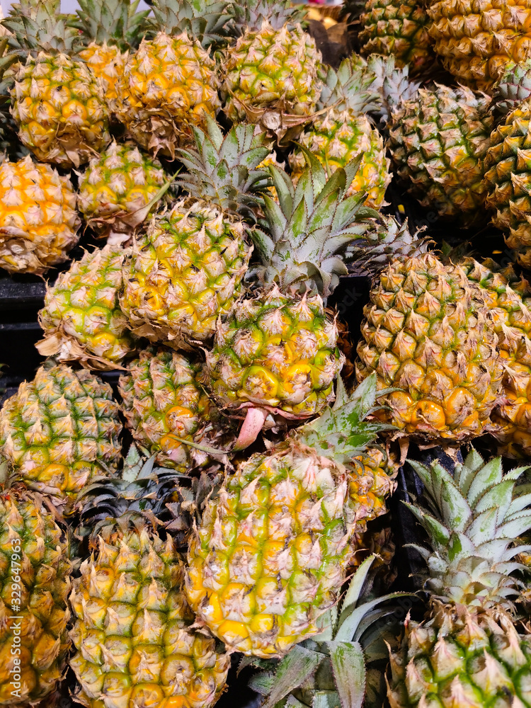 Beautiful a lot of fresh pineapple background and fresh fruit Beautiful a lot of fresh pineapple background and fresh fruit