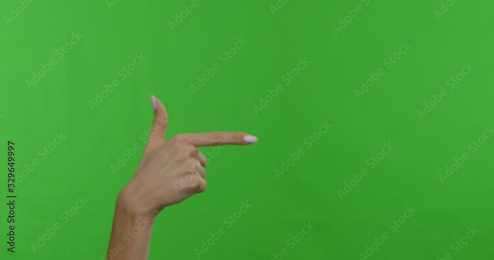Woman hand pointing aside on copy space, chroma key background