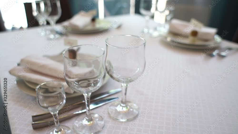 table with glasses and decor in a restaurant table with glasses and decor in a restaurant