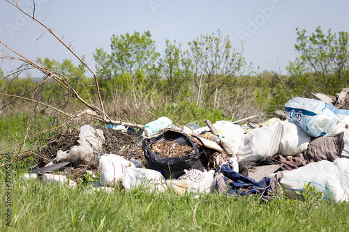 garbage dump in the field. Environmental pollution. Global problems of mankind