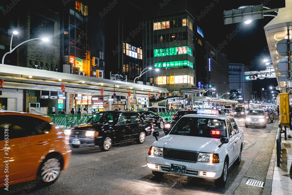Taxi, cars and lights, Kyoto downtown, Japan
