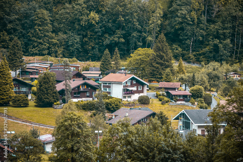 View of a typical Swiss village in a valley. Switzerland © bbgreg