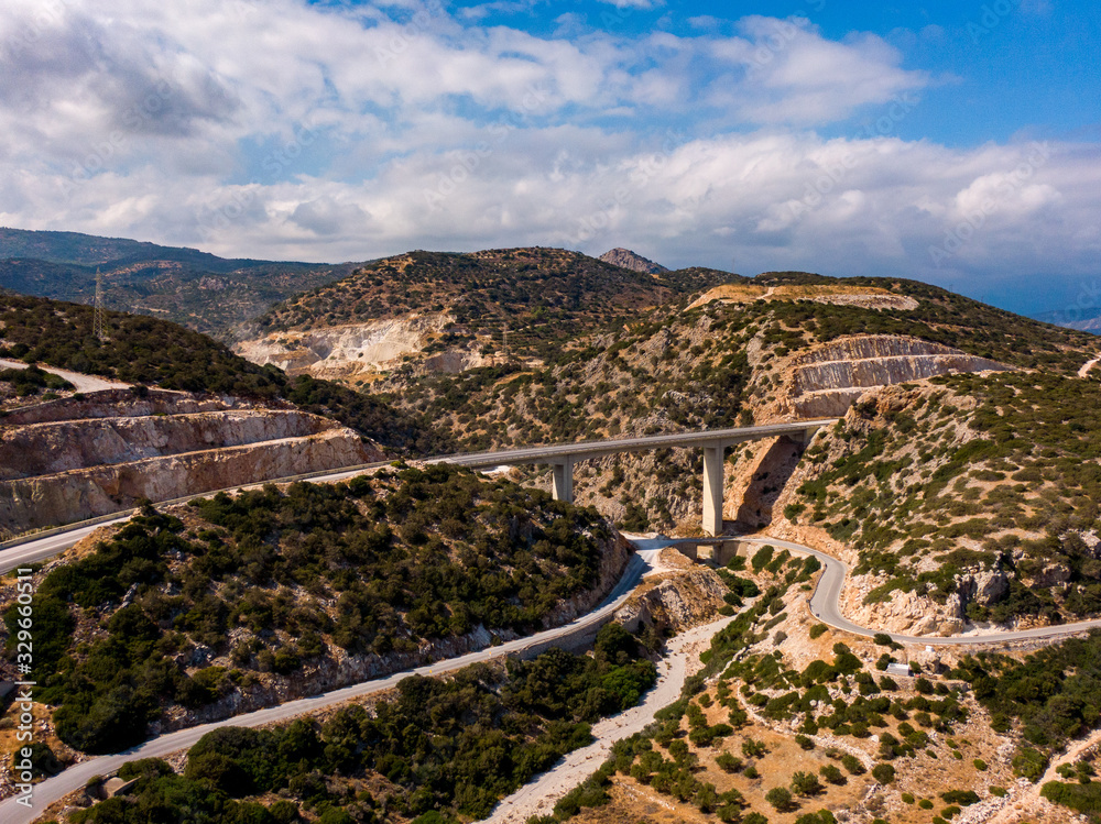 A view from above of the auto-bridge in the mountains of Greece on the island of Crete, around Greek nature. Aerial photography