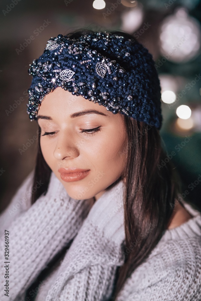 Portrait of beautiful young brunette woman with makeup in hat Portrait of beautiful young brunette woman with makeup in hat