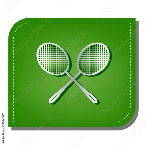 Two tennis racket sign. Silver gradient line icon with dark green shadow at ecological patched green leaf. Illustration.