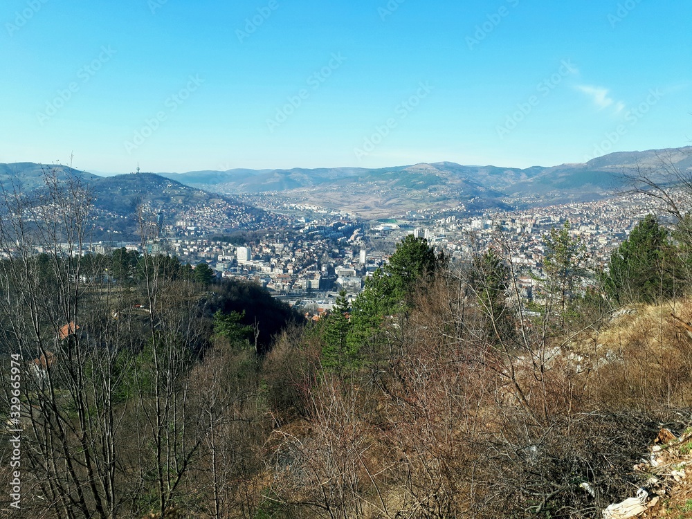 Fototapeta premium City view in early spring from a mountain 
