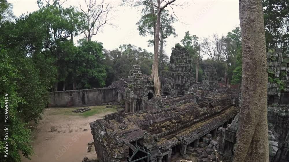 Aerial Flying Over Ancient Asian Temple With Trees Growing Inside Aerial Flying Over Ancient Asian Temple With Trees Growing Inside