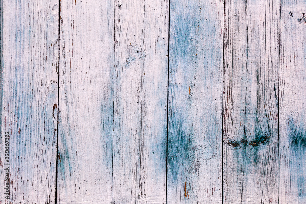 Old painted wooden fence. Background texture. Old painted wooden fence. Background texture.
