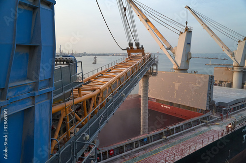 Port grain elevator. Industrial sea trading port bulk cargo zone grain terminal © Alexey Lesik