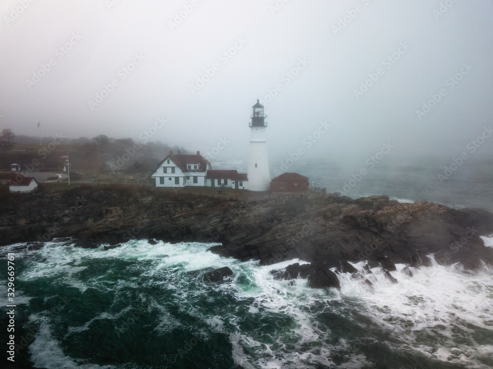 Fog Covered Lighthouse on the Coast of Maine