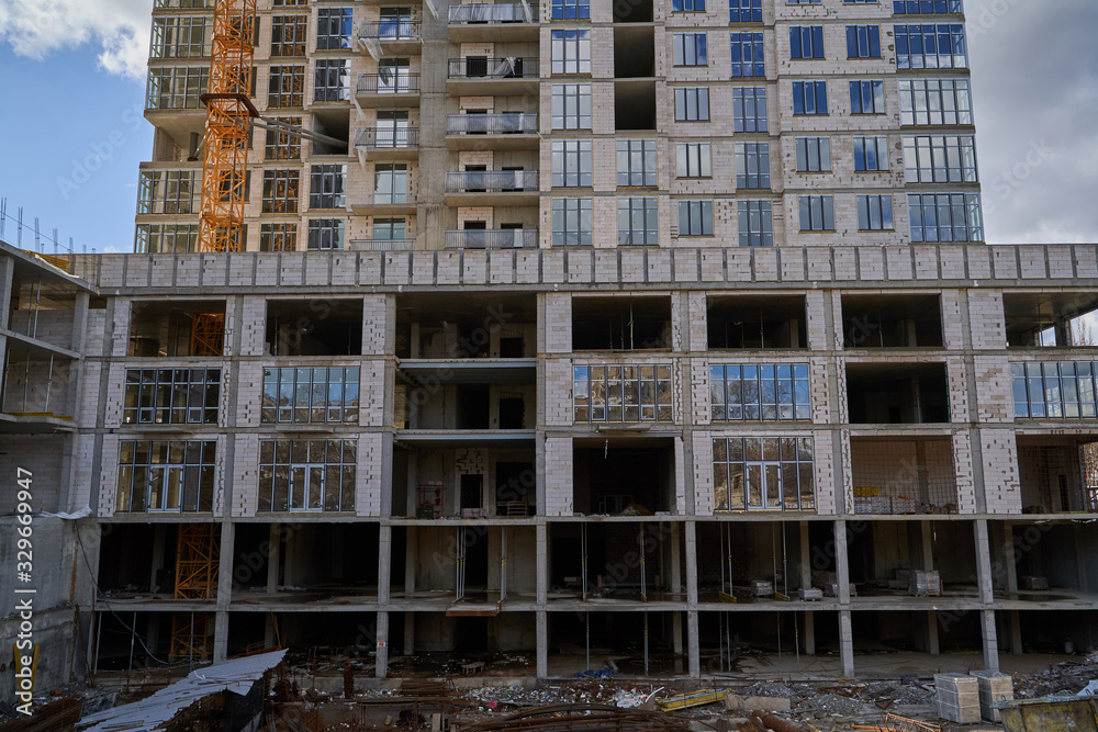 Construction site. High rise Building under construction. Construction of high-rise residential building Construction site. High rise Building under construction. Construction of high-rise residential building