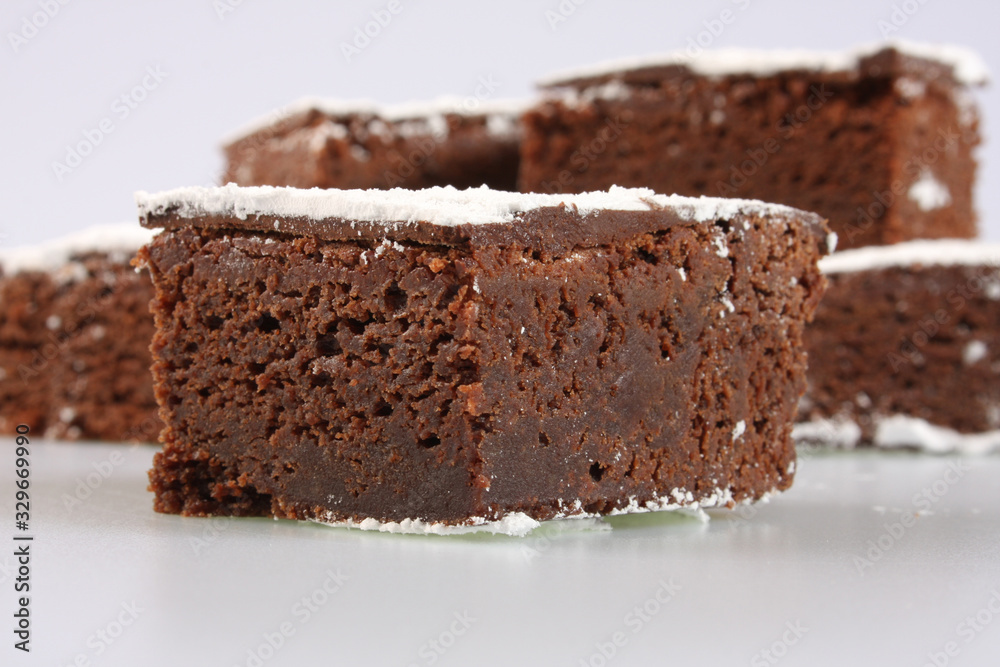 A studio photograph of chocolate brownies A studio photograph of chocolate brownies