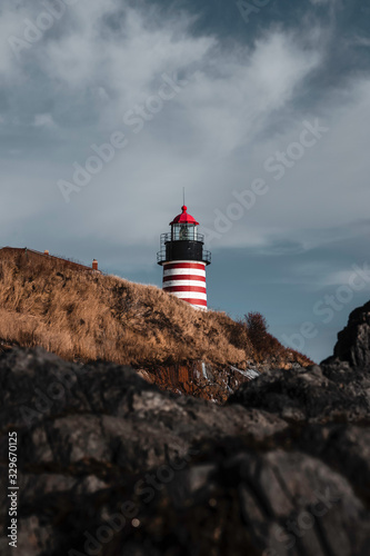 Red Striped Lighthouse on the Coast of Maine