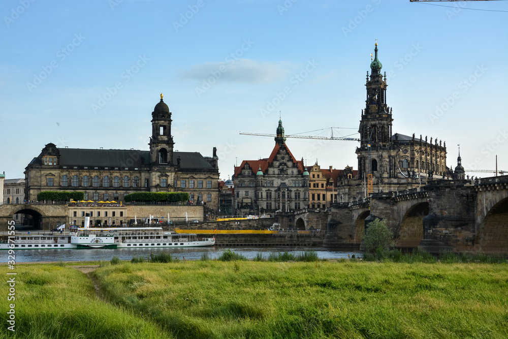 The riverside of Dresden with the tower Hausmannsturm and the river Elbe