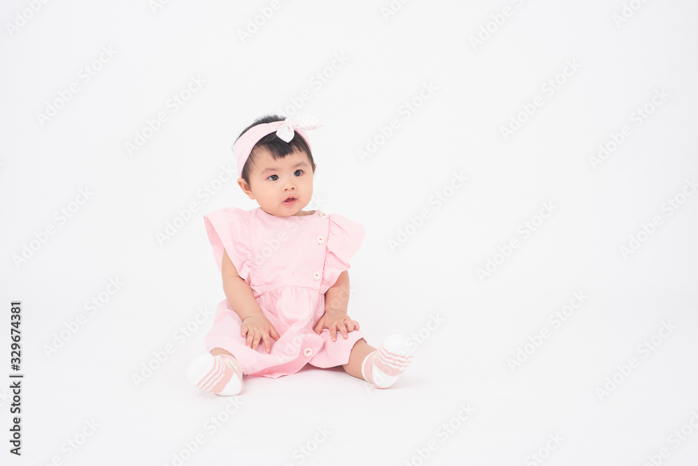 Adorable Asian baby girl is portrait on white background