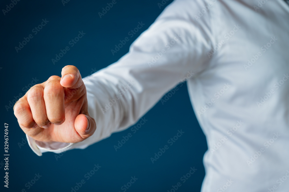 Hand of a businessman touching virtual interface screen Hand of a businessman touching virtual interface screen