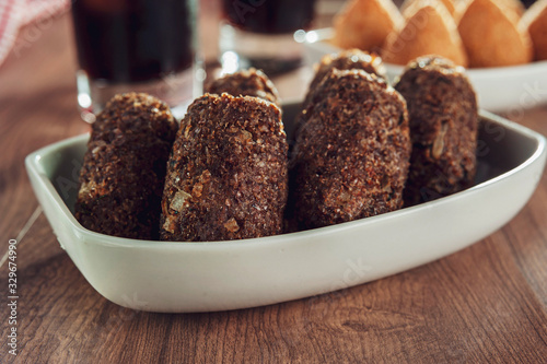 Brazilian appetiser kibbeh (Middle Eastern minced meat and bulghur fried snack) photo