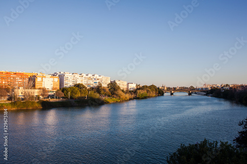Guadalquivir River. Panoramic view of the waterfront of the Guadalquivir River in Seville  Andalusia  Spain. Picture taken 22 march 2020.
