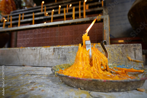 temple candle with fire in Buddha religion for chiang rai thailand photo