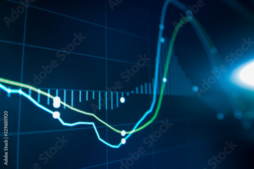 Blue Stock Exchange Market trading graph on screen monitor for economic and financial investment. Business analysis chart display. Stock invest infomation.