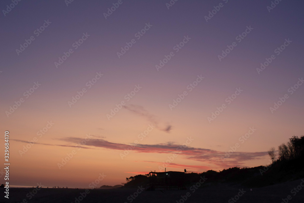 violet sky at sunset in montevideo beach, uruguay