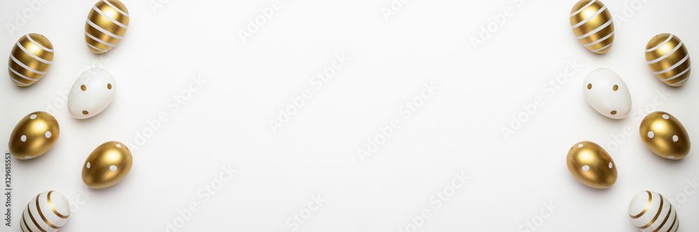 Easter egg background with golden shine decorated eggs in basket isolated on white. Happy Easter Easter egg background with golden shine decorated eggs in basket isolated on white. Happy Easter