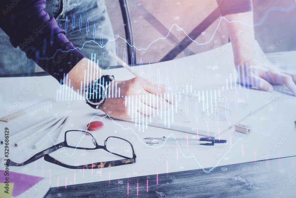Multi exposure of man standing and planing investment with stock market forex chart.