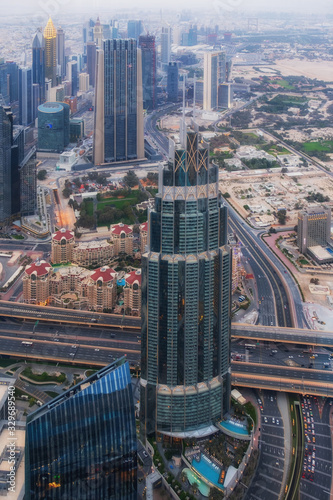 DUBAI, UAE - may 2019: Aerial view of Downtown Dubai with man made lake and skyscrapers from the tallest building in the world, Burj Khalifa, at 828m photo