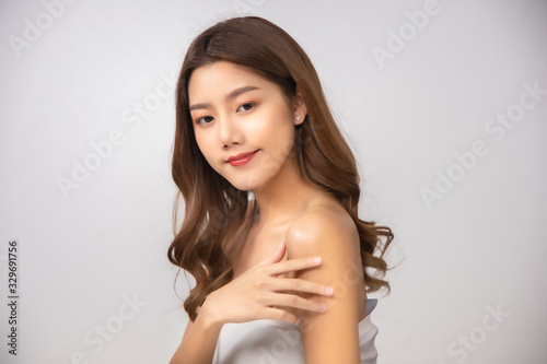 Beautiful Young Asian Woman short hair  with Clean Fresh Skin. Face care  Facial treatment  Cosmetology  beauty and healthy skin and cosmetic ideas concept .woman beauty skin isolated .