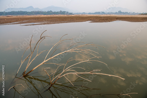 The water in the Mekong River has fallen to a critical level, Sangkhom district, Loei province, Thailand photo