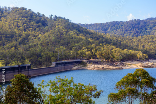 Low water level at the dam wall at Tinaroo Falls Dam in Queensland, Australia photo