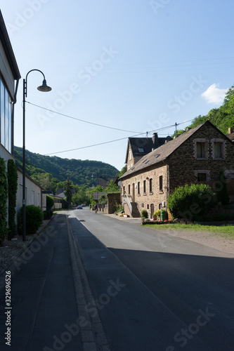 Germany, Moselkern Forest, a house that has a sign on the side of a road