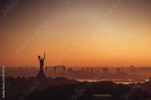 Mother Motherland monument at sunset. In Kiev, Ukraine.