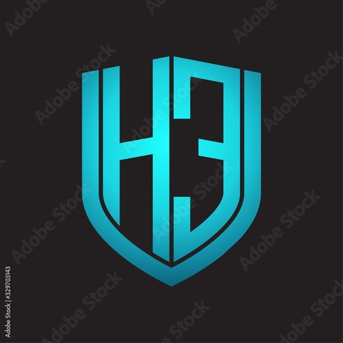 HE Logo monogram with emblem shield design isolated with blue colors on black background