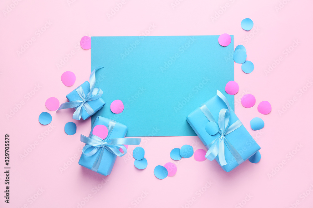 Blank card and Birthday gifts on color background