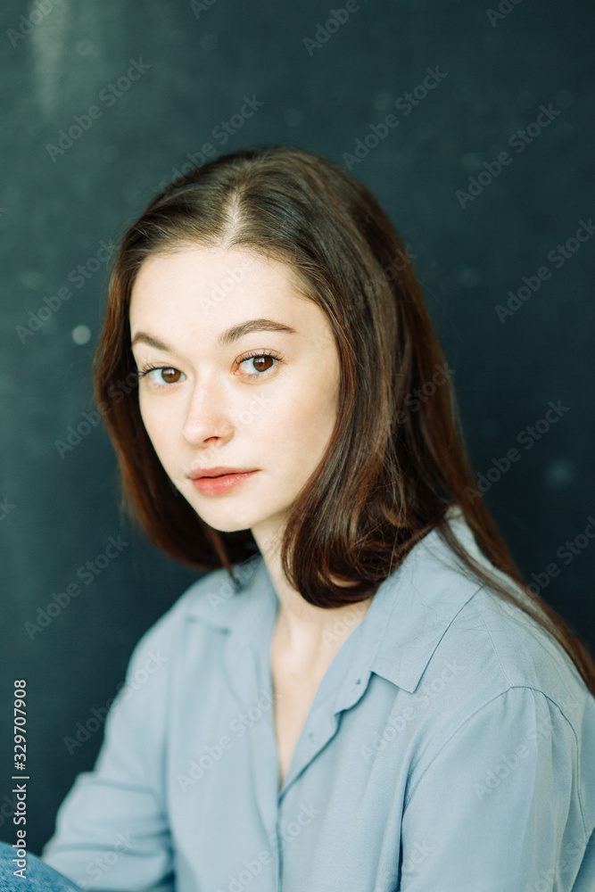 Professional model and pose at the cyclorama. Model tests of a girl in a Studio with a white background. Professional model and pose at the cyclorama. Model tests of a girl in a Studio with a white background.