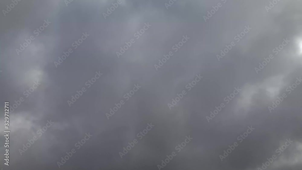 Mid afternoon thunderstorm rain clouds forming and blending across the african horizon time lapse, noise free 4k footage. Mid afternoon thunderstorm rain clouds forming and blending across the african horizon time lapse, noise free 4k footage.