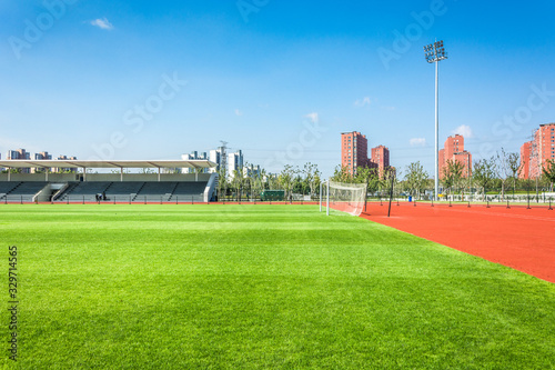 Panoramic view of soccer field stadium and stadium seats photo